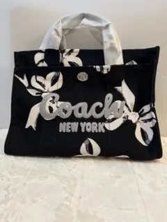 COACHコーチ大容量34cmリボン柄カーゴトートバッグ - メルカリ