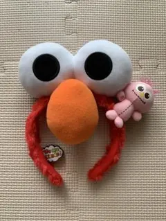 エルモ カチューシャ ピンクのぬいぐるみ付き