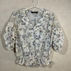 Wclosetの花柄のトップス