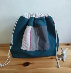 ブルーグリーンの生地　パッチワーク　刺し子糸　手刺繍　大きめ巾着　ハンドメイドのサムネイル