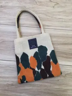 ウール節糸で織られた独特の風合い「mina」爆発人気のミニバッグ