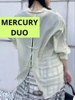 【MERCURY DUO】マーキュリーデュオ バックリボンシアーシャツ ライムのサムネイル