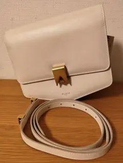 新品未使用タグ付き】ALAÏA バッグ ブラック PAPA保存袋付き - メルカリ