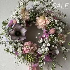 クリスマスローズとスターチスの桜色リース　雪柳　ストック　かすみ草　千日紅　春