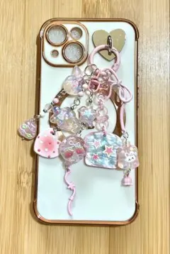 ピンクのキュートなチャーム付き