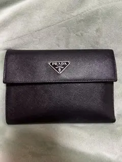 PRADA】エンボスロゴ レザーケース - メルカリ
