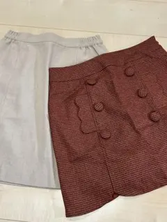 千鳥格子柄のスカートとベージュのスナイデル のスカート