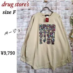 ドラッグストアーズ★ロゴinマルチ柄スタンディぶたちゃんのトレーナー★ベージュ