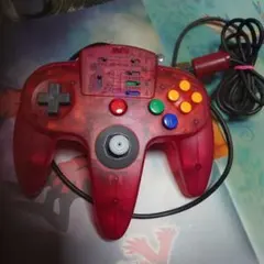 ジャンク。NINTENDO64 アスキー製品クリアレッドコントローラー
