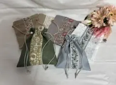 ハンドメイド　コットン生地とインド刺繍リボンの巾着ポーチ