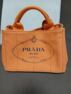 PRADA キャンバス トートバッグ オレンジのサムネイル