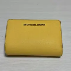 マイケルコース　二つ折り財布　イエロー