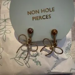 ゴールド リボン型 ノンホールピアス