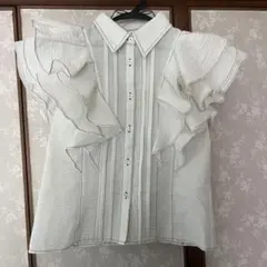 シェリエ sheller スリーブレスフリルブラウス | Mercari