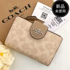 新品　正規品☆COACH コーチ　折り財布　ライトカーキ 二つ折り財布のサムネイル