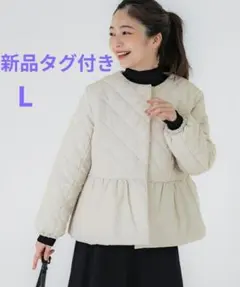 新品未使用タグ付き　パール付きペプラムコートのサムネイル