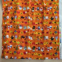 日本製ハロウィンモチーフの綿生地（オレンジ）コスモテキスタイル