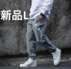 新品 NIKE ナイキ ウーブン ジョガーパンツ グレー 刺繍ロゴ