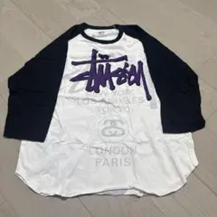 Stussy グラフィックラグランTシャツ