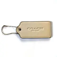 COACH コーチ ロゴチャーム ベージュ