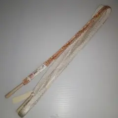 (7) 金色と白色とピンク？の帯締め　絹100% 価格28000円