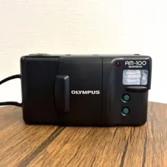 OLYMPUS AM-100 クォーツデート 純正ケース付き 2026年最新】olympus am-100の人気アイテム - メルカリ