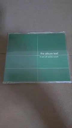 the album leaf in an off white room