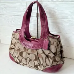 美品 COACH エルゴ がま口 バッグ Ergo Kiss Rock Bag - メルカリ