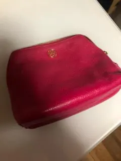 新品未使用】TORY BURCH レザーポーチ ラズベリー - メルカリ