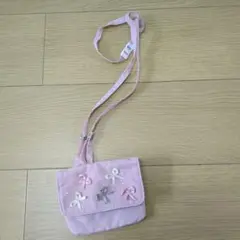 リボン装飾のピンクショルダーバッグ