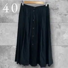 ブラック プリーツスカート 前面ボタン式　L