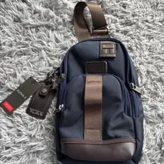 美品】TUMI 232399NVYRE ケリー スリングバッグ - メルカリ
