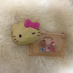 セリア・ダイソー　日焼けキティ　つけまつげケース・フラットポーチ