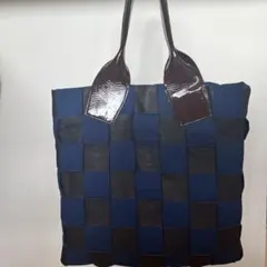 STEANIA ROMAN のトートバッグ ネイビー と革製のブラウン編み