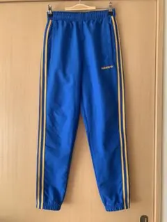 アディダスオリジナルス　ウーブントラックパンツ　ブルー　S