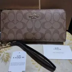 COACH 長財布 ベージュストラップ付き