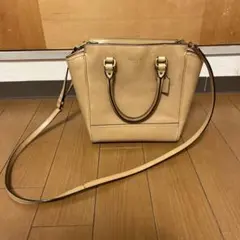 コーチ　ベージュ