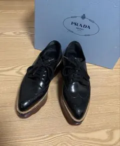 2026年最新】PRADA ウイングチップの人気アイテム - メルカリ