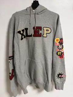 XLARGE×ERASED パーカー - メルカリ