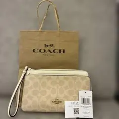 新品タグ付　COACH ダブル ジップ ウォレット・シグネチャーのサムネイル