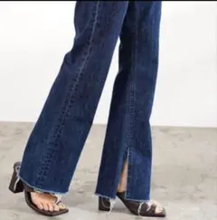 ヤヌーク リメイク ブーツカットデニムパンツ インディゴブルー 濃紺