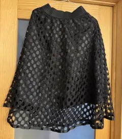 縦長楕円穴あきデザイン　フレアスカート 黒