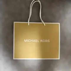 MICHAEL KORS ショップ袋 ゴールド 約30cm x 25cm