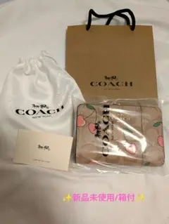 ✦COACH✦二つ折り財布シグネチャーチェリープリント がま口のサムネイル