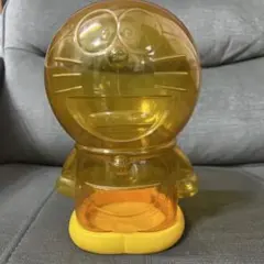 ドラえもん 透明オレンジ 貯金箱