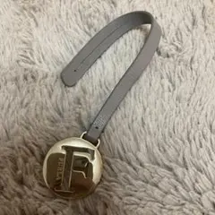新品未使用品　FURLA フルラ ロゴ チャーム フィルム付き　グレーのサムネイル