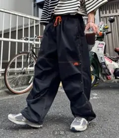 SOUNDS GOOOD ブラックオレンジ ダブルニースタッズパラシュートパンツ