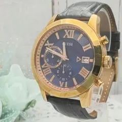 GUESS ゴールド ネイビー クロノグラフ腕時計 - メルカリ