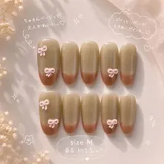 【現品限定】ちゅるんベージュのリボンマグネットネイル