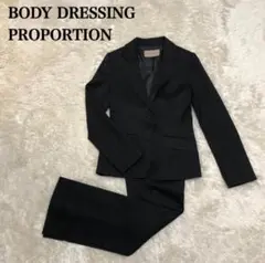 PROPORTION BODY DRESSING